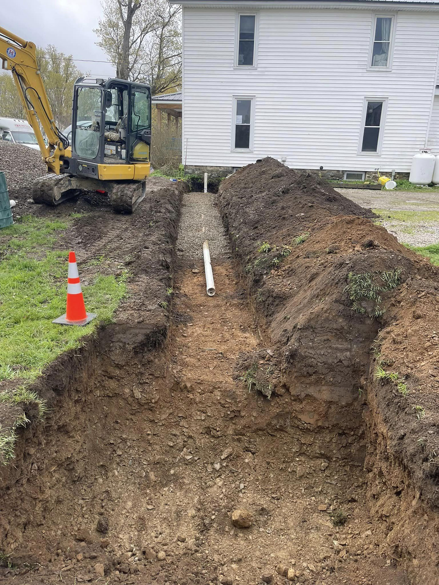 Installation of a new septic tank and leach field