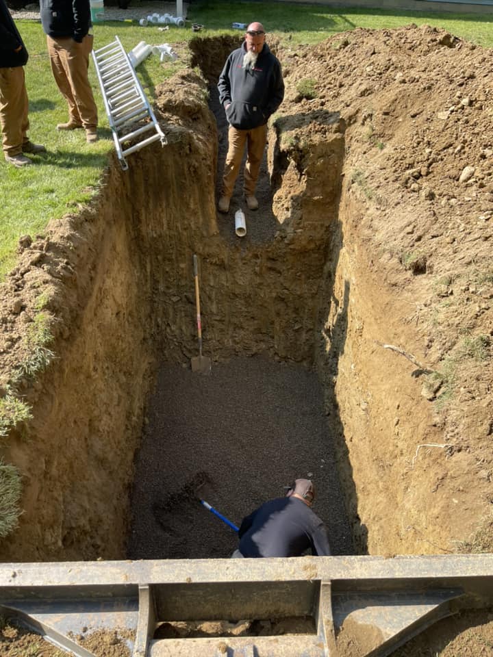 Installation of a new septic tank and leach field