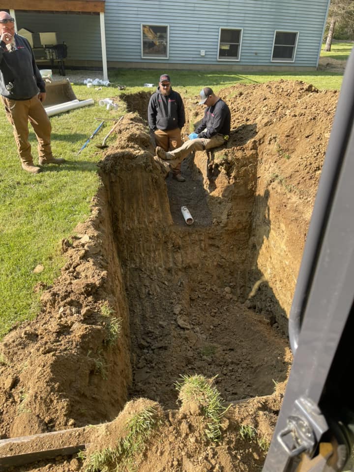 Installation of a new septic tank and leach field