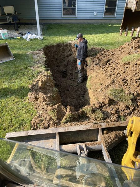 Installation of a new septic tank and leach field