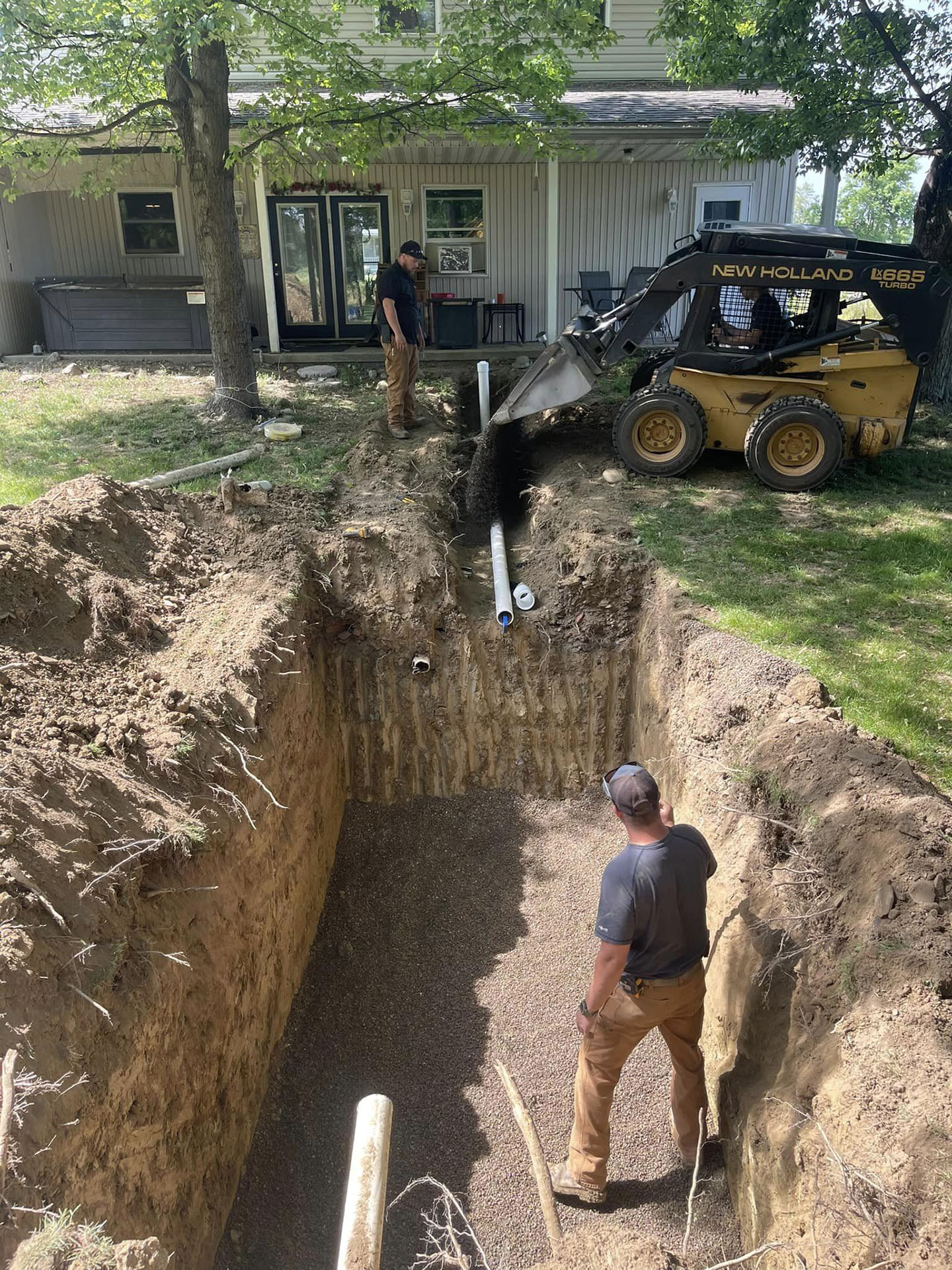 Installation of a new septic tank and leach field