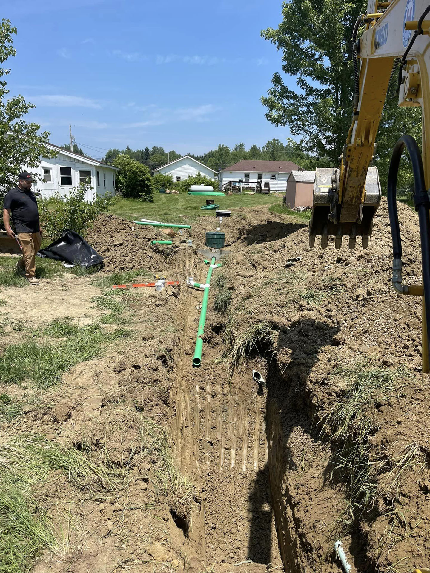 Installation of a new septic tank and leach field