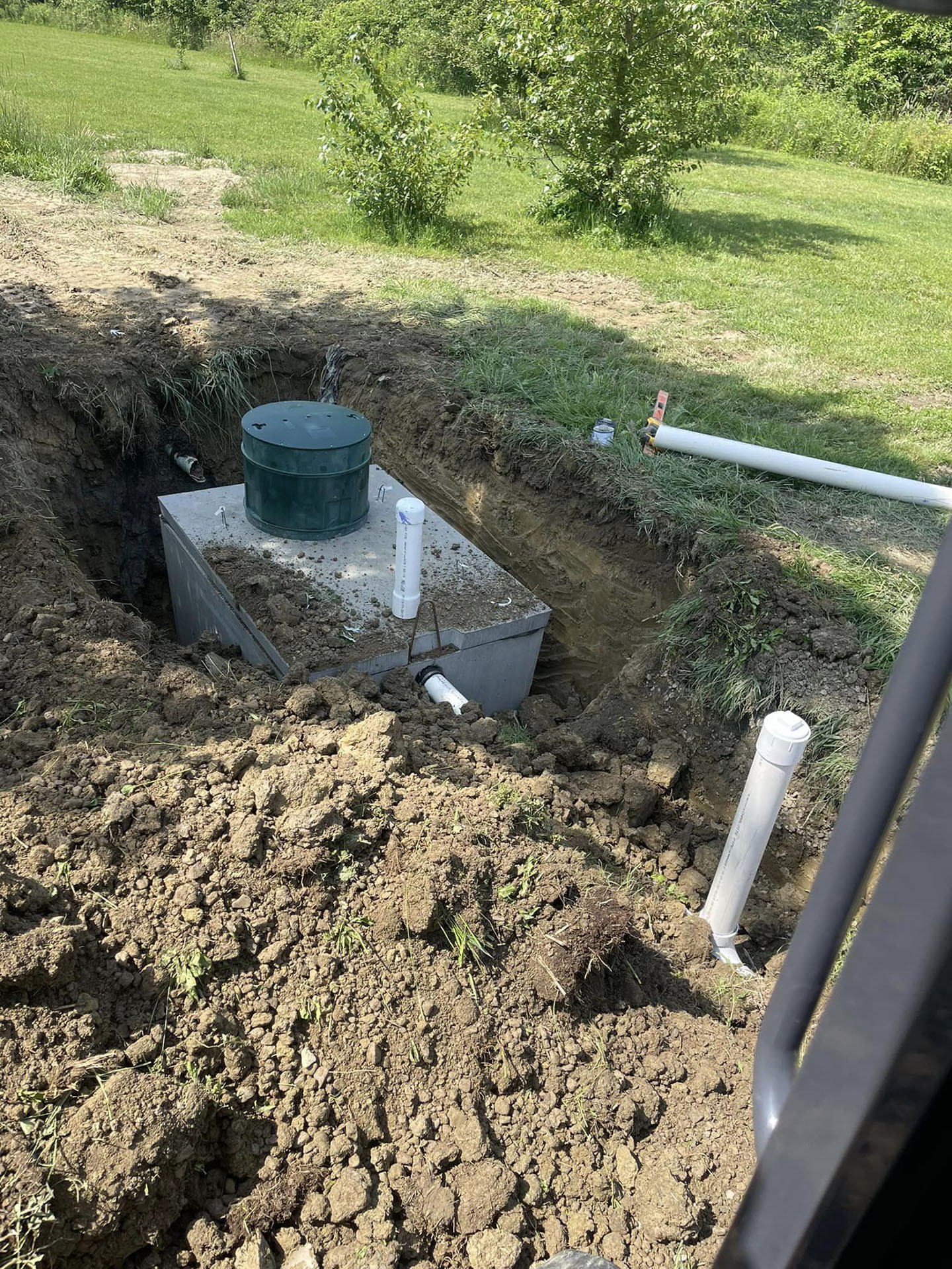 Installation of a new septic tank and leach field