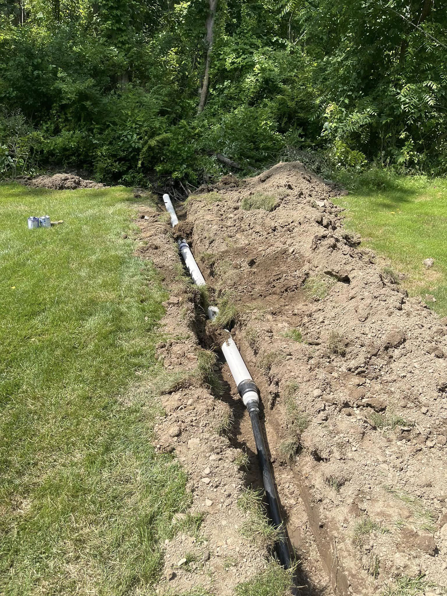 Installation of a new septic tank and leach field