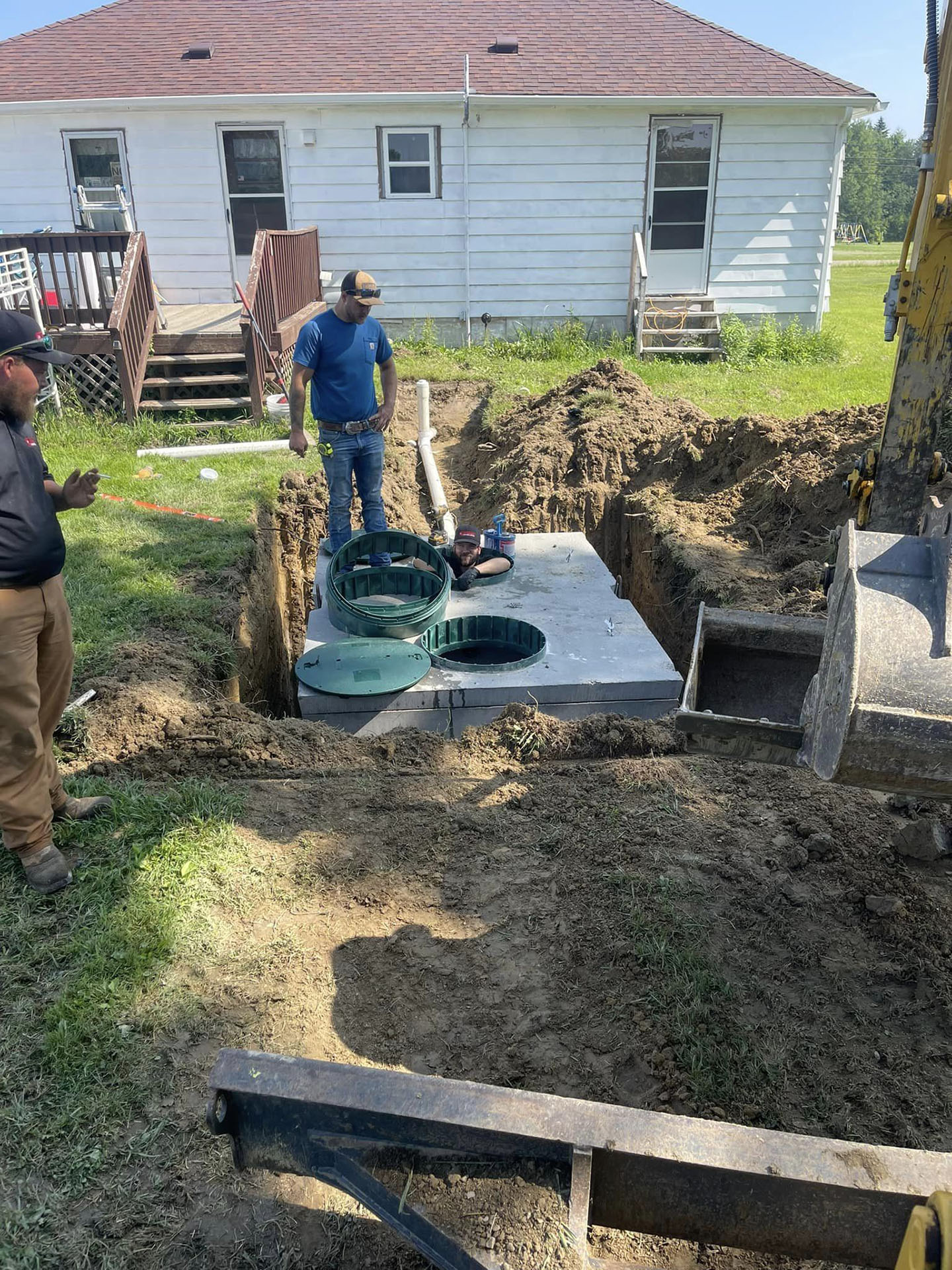 Installation of a new septic tank and leach field