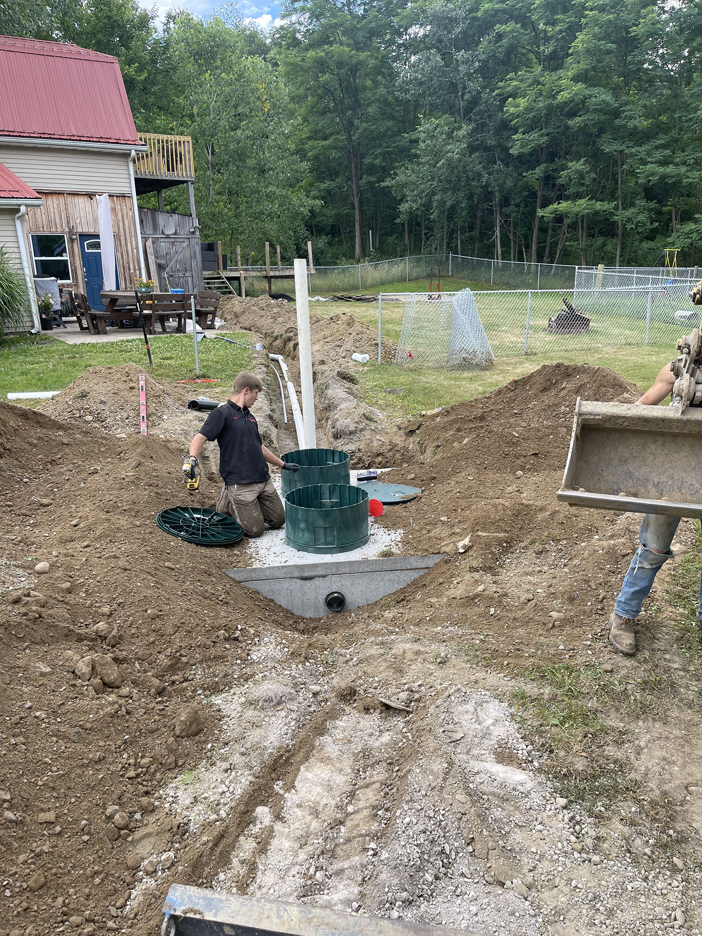 Installation of a new septic tank and leach field