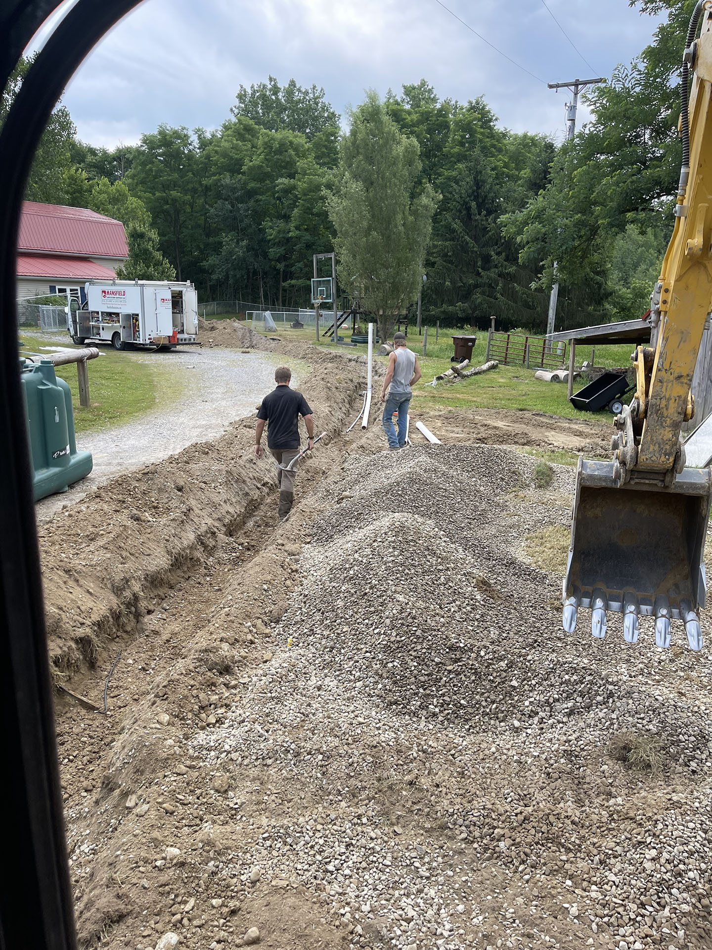 Installation of a new septic tank and leach field